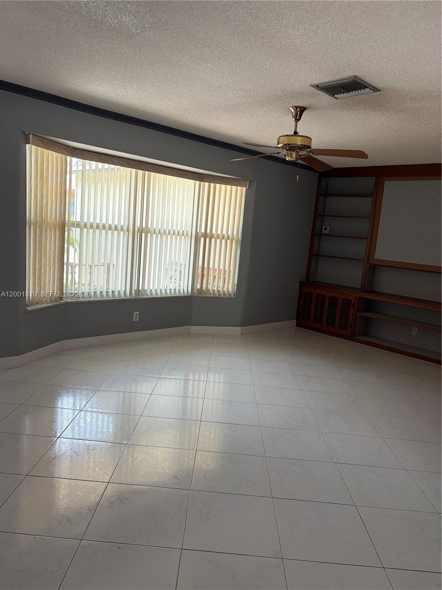 3205 Liberty Street Hollywood, FL 33021 - Photo 7 of 12 a view of an empty room with a window