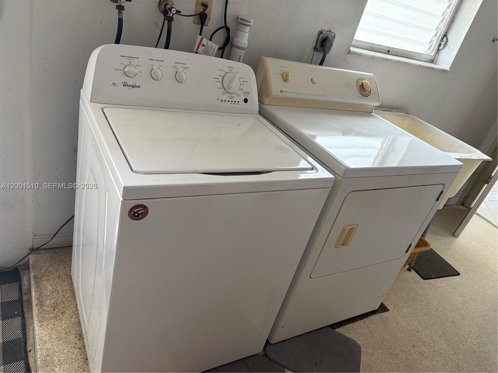 3205 Liberty Street Hollywood, FL 33021 - Photo 8 of 12 a utility room with dryer and washer