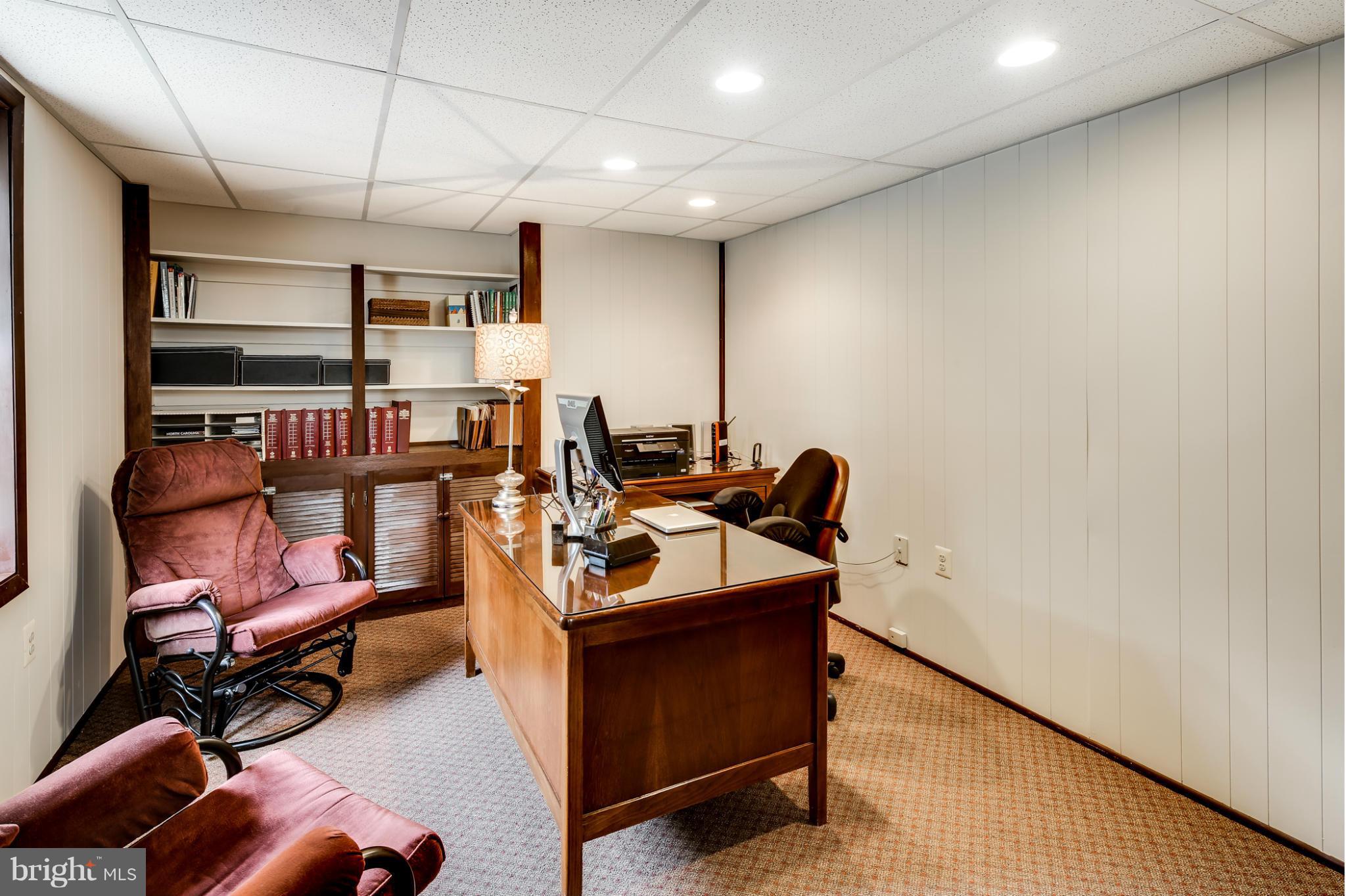 14608 Cutstone Way Silver Spring, MD 20905 - Photo 25 of 30 a room with furniture