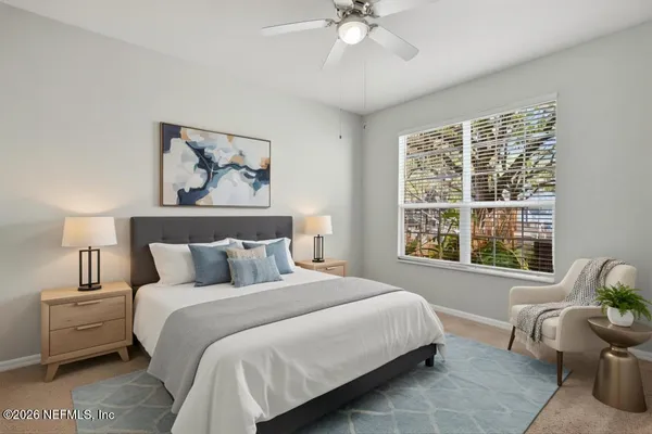 a kitchen with stainless steel appliances a stove a microwave and cabinets