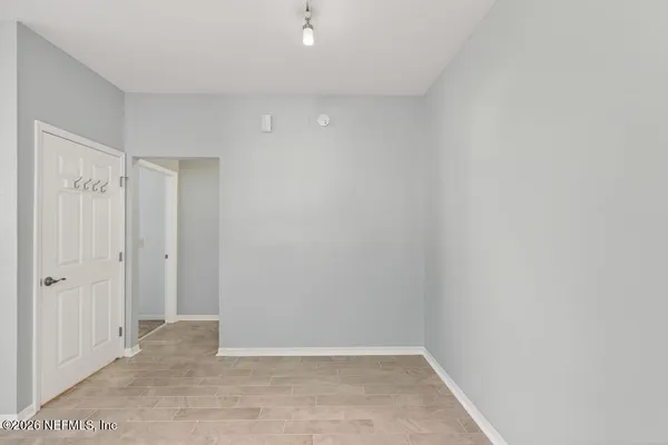 a kitchen with a refrigerator sink and stove