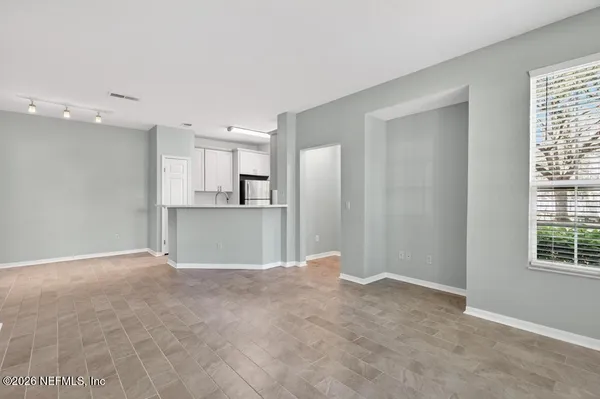 a view of swimming pool with seating space