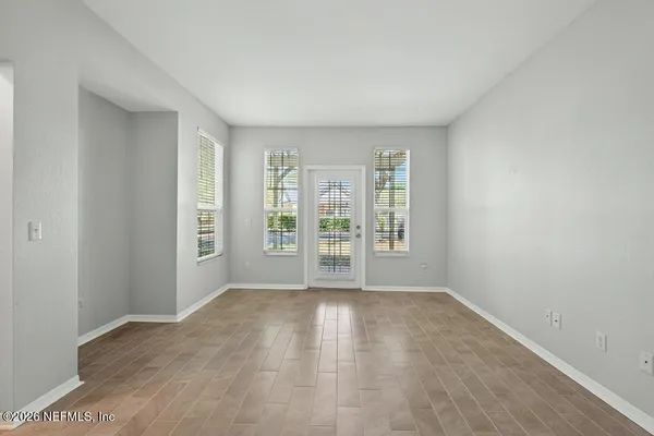 a view of swimming pool with outdoor seating and lake