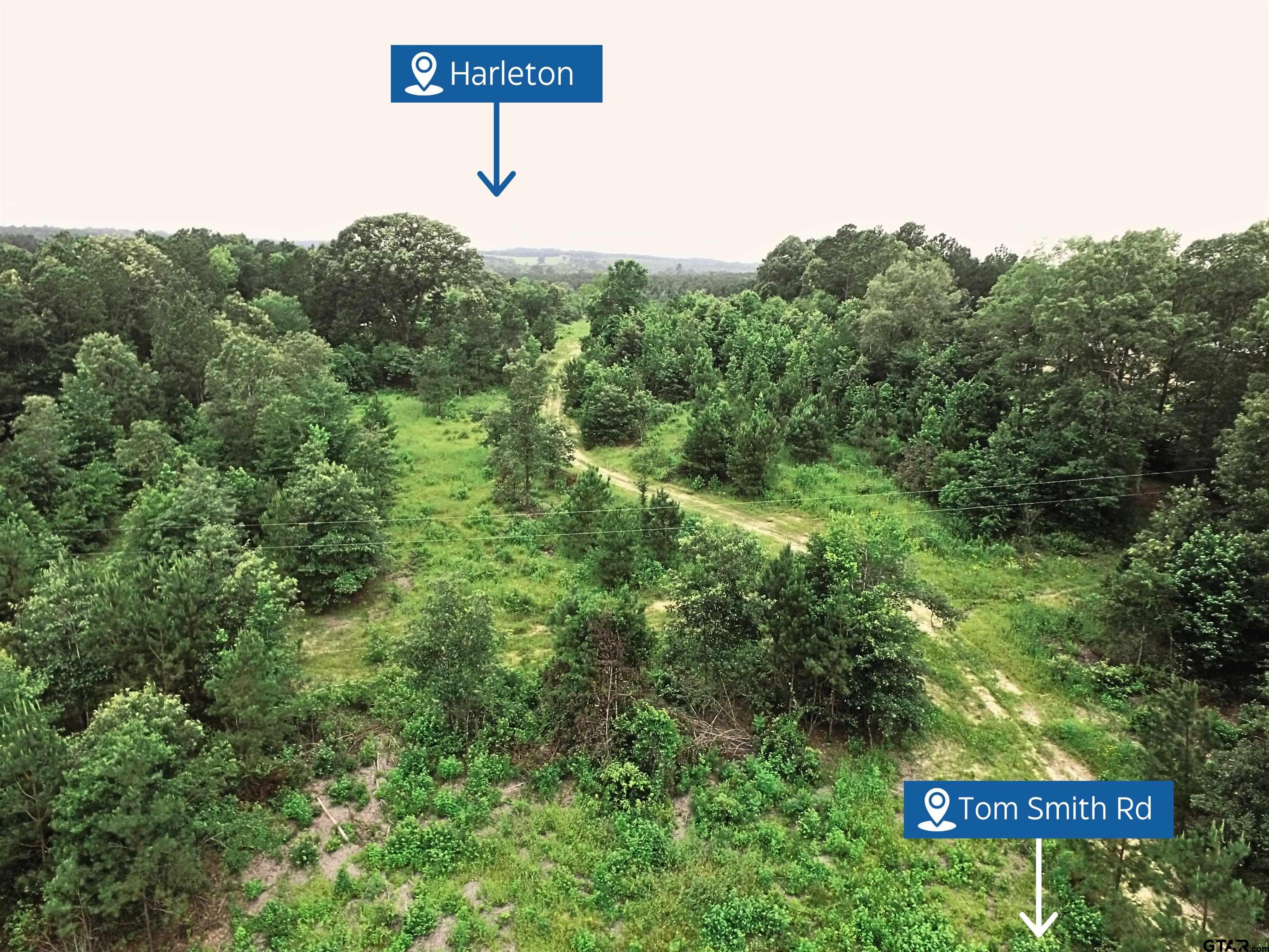 Tbd Tom Smith Road Harleton, TX 75651 - Photo 4 of 13 a view of a sign board