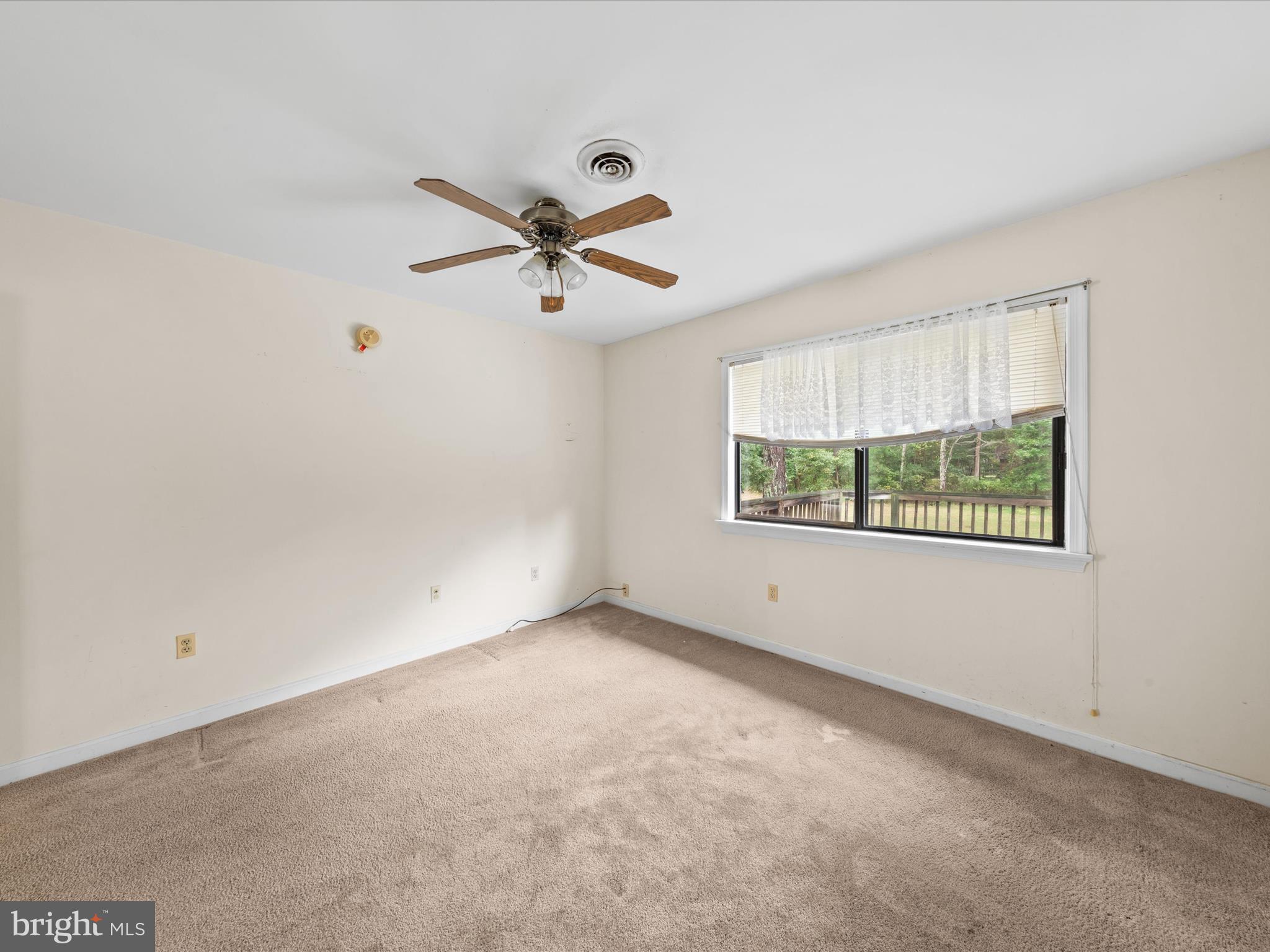 935 Susquehanna Road Madison, MD 21648 - Photo 25 of 42 an empty room with a window