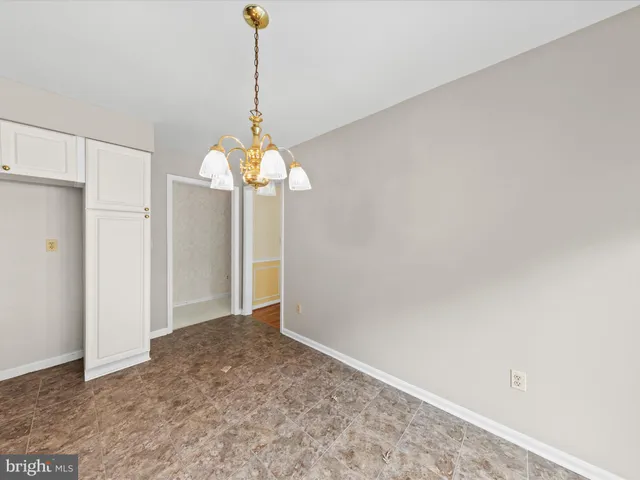a view interior of a house with a chandelier fan
