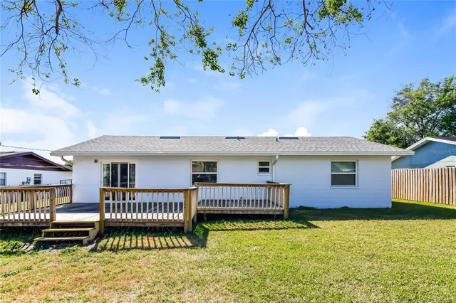 a view of a house with a roof deck
