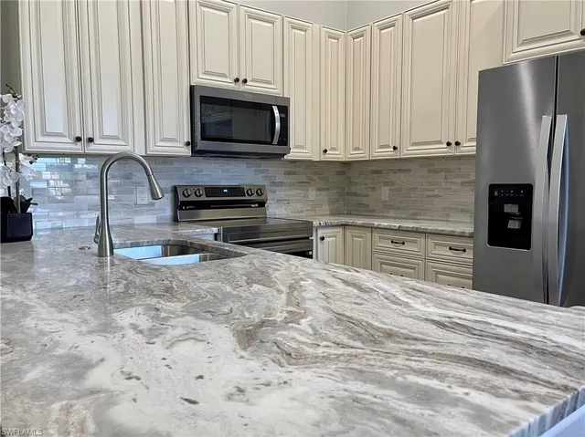 $418,000 | 6765 Huntington Lakes Circle, Unit 201, Naples, FL 34119