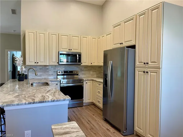 $418,000 | 6765 Huntington Lakes Circle, Unit 201, Naples, FL 34119