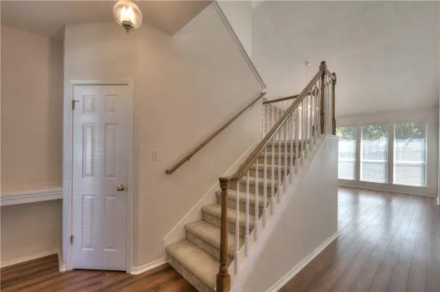 a view of entryway with wooden floor