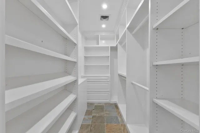 a view of a living room and chandelier