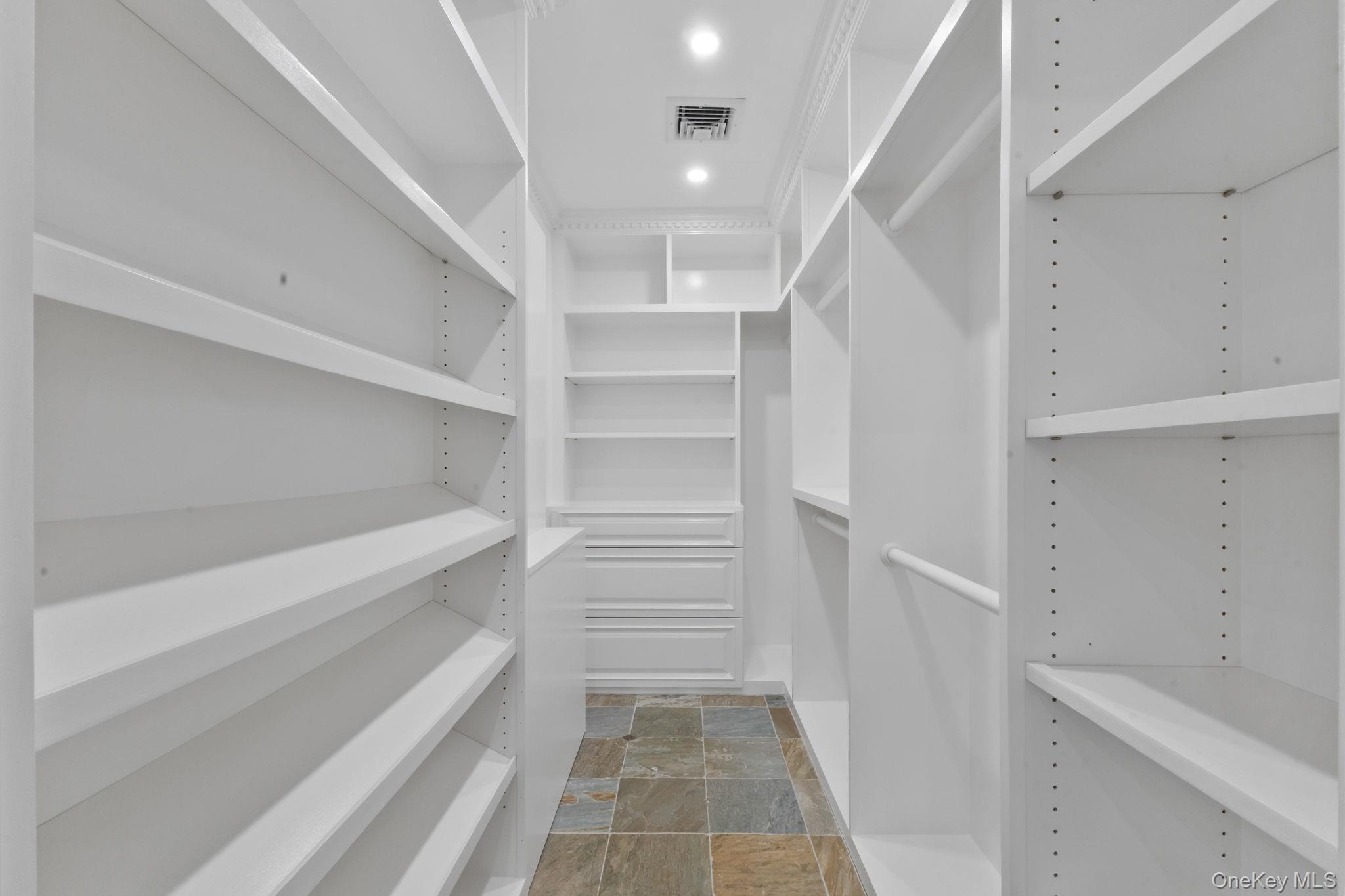 675 Quaker Road Chappaqua, NY 10514 - Photo 18 of 34 a view of walk in closet