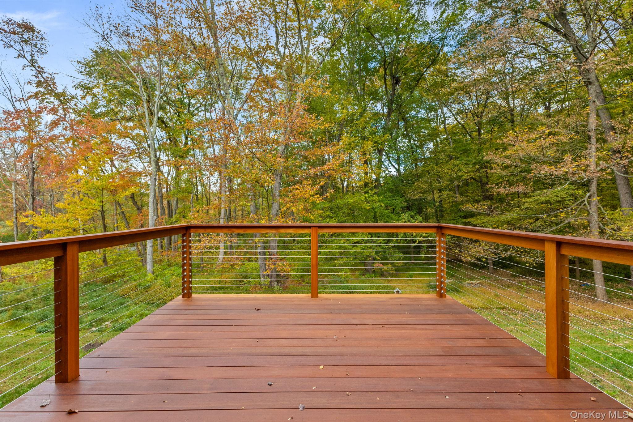 675 Quaker Road Chappaqua, NY 10514 - Photo 26 of 34 a view of ocean from a balcony
