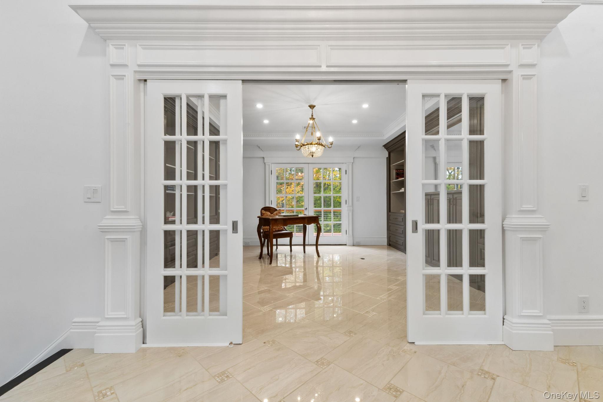 675 Quaker Road Chappaqua, NY 10514 - Photo 10 of 34 a view of a livingroom with furniture and staircase