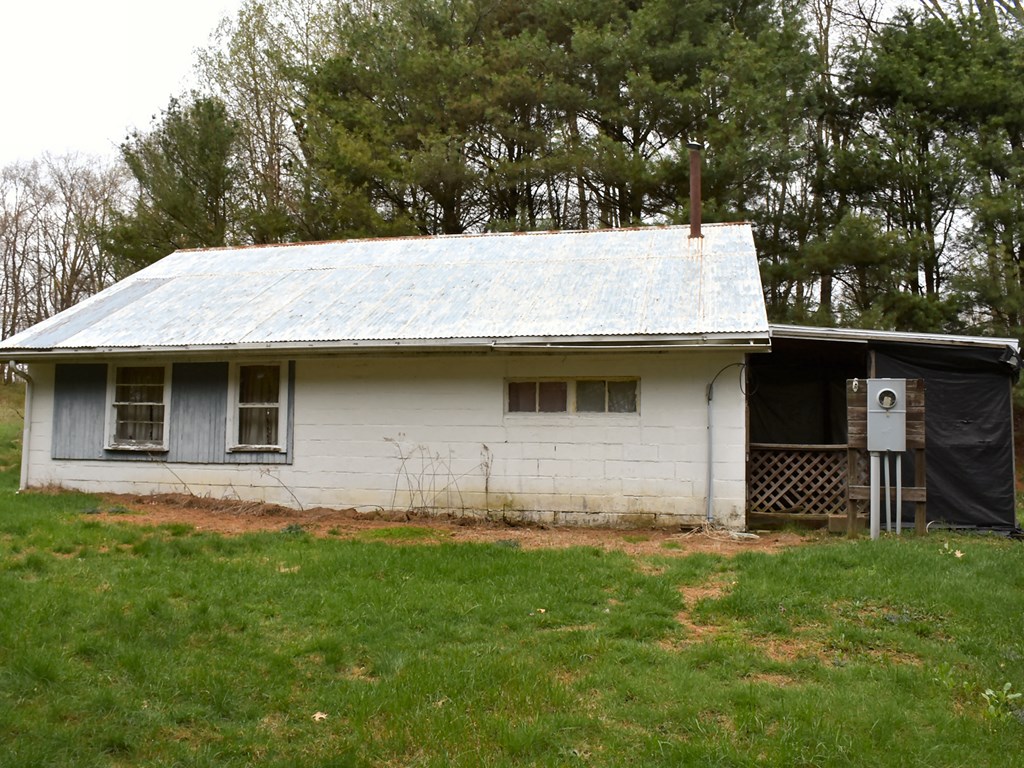 28762 Deckards Road Cochranton, PA 16314 - Photo 6 of 18 a front view of a house with a garden