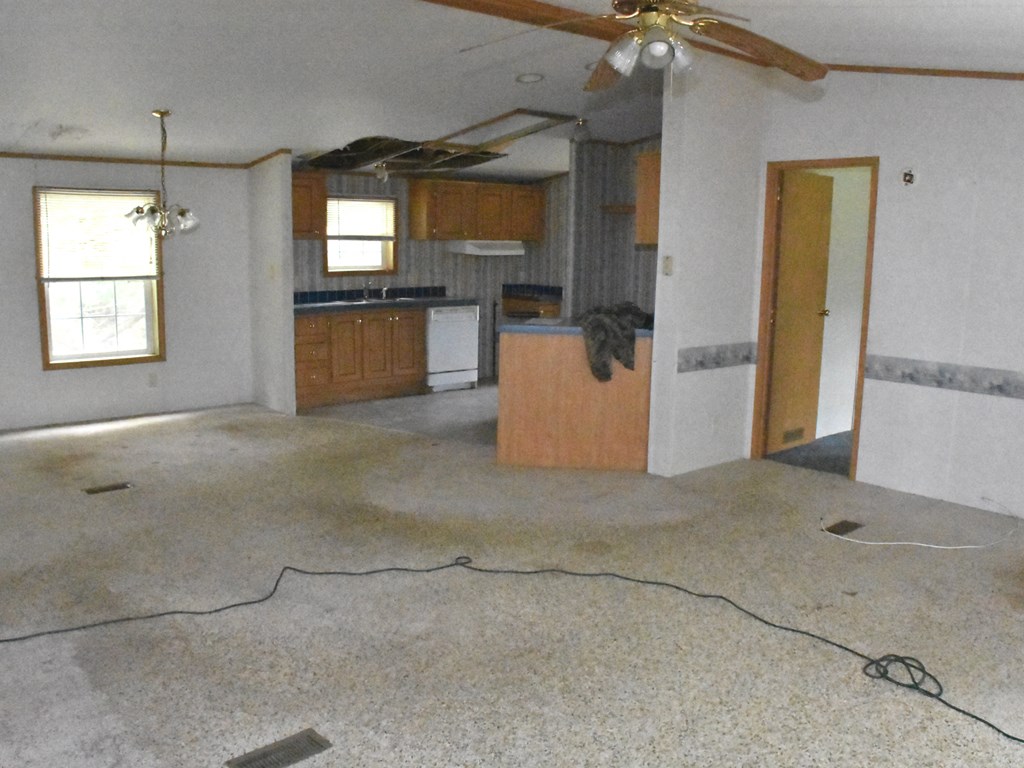 28762 Deckards Road Cochranton, PA 16314 - Photo 8 of 18 a view of a kitchen with a sink and cabinets