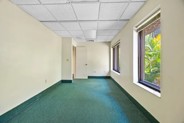 a view of a room with a large window