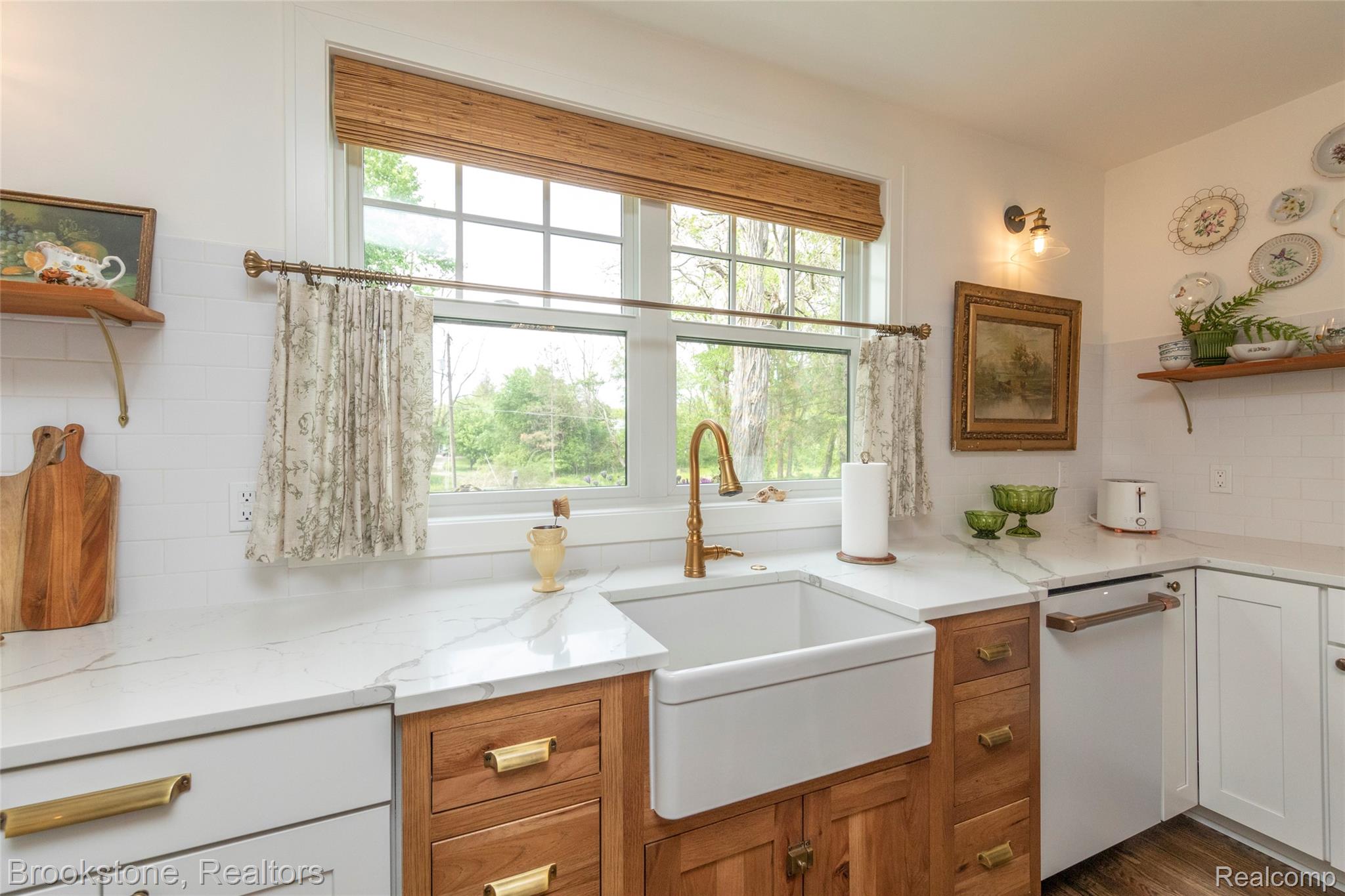 8322 Buckell Lake Road Holly, MI 48442 - Photo 35 of 58 Farm sink with a sunny west facing view
