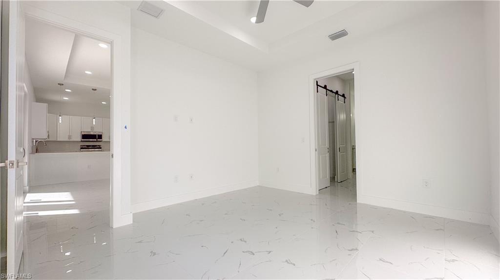 1028 19th Street Southwest Naples, FL 34117 - Photo 15 of 50 a view of an empty room