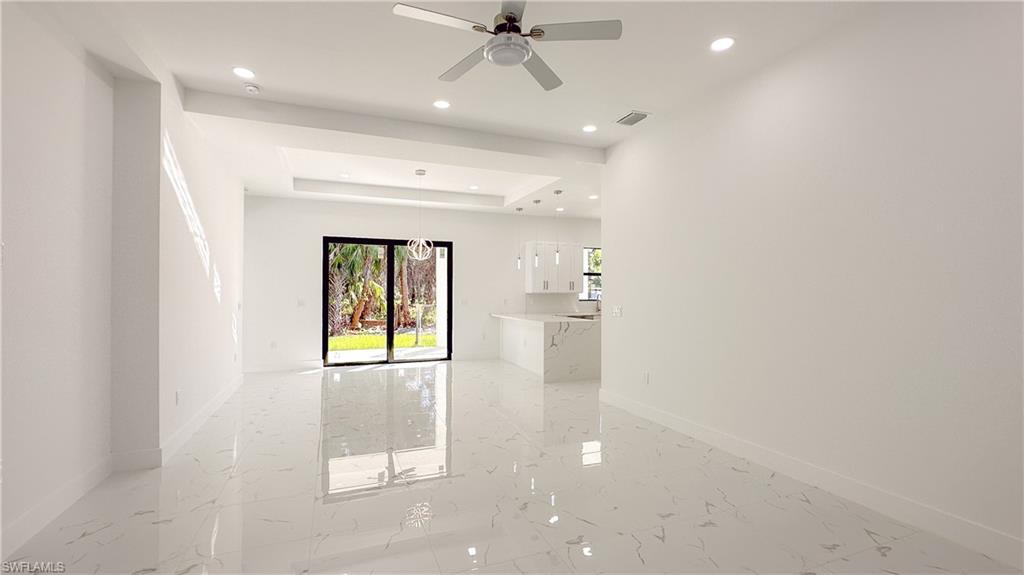 1028 19th Street Southwest Naples, FL 34117 - Photo 26 of 50 an entryway in a hall with a window