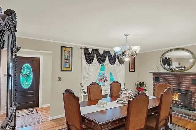 a living room with furniture a rug and a window