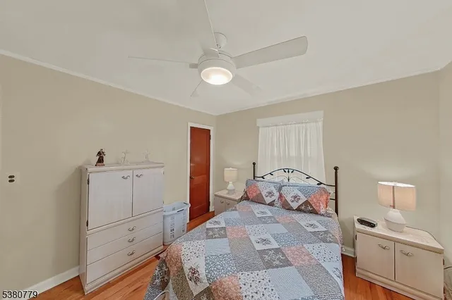 a bedroom with a bed and a cabinets