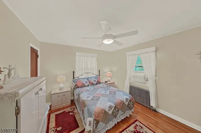 a bed room with a bed and a window