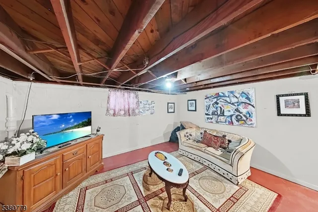 a view of a livingroom with furniture