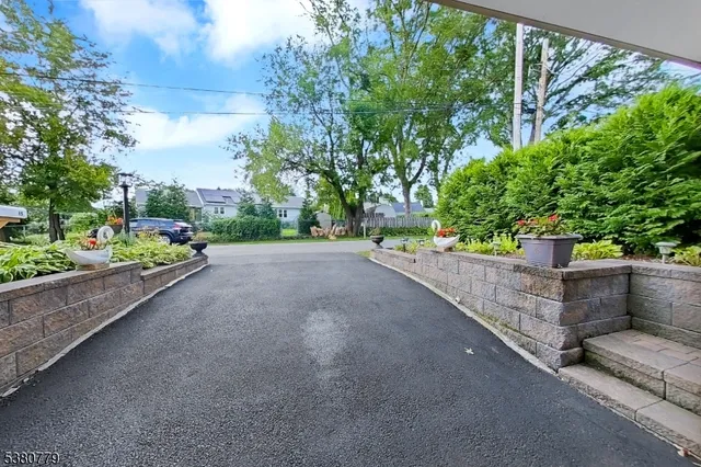a view of a garden with an outdoor space
