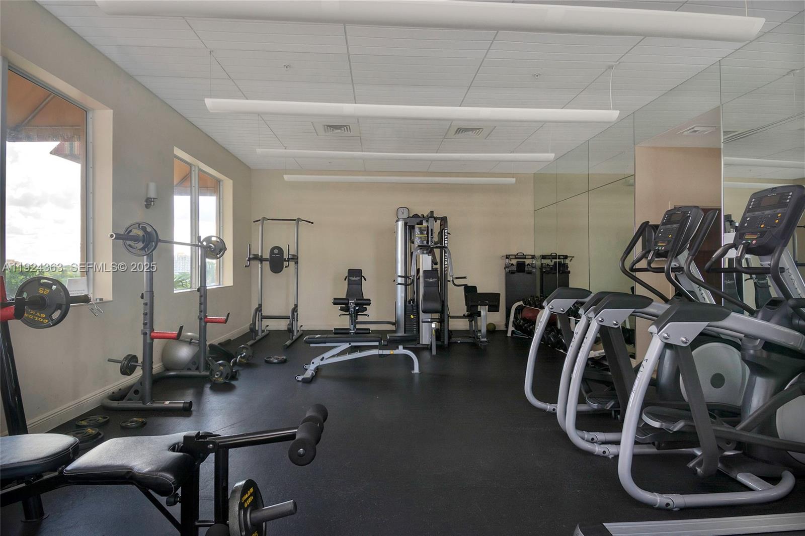 3232 Southwest 22nd Street, Unit 905 Miami, FL 33145 - Photo 20 of 24 a view of a room with gym equipment