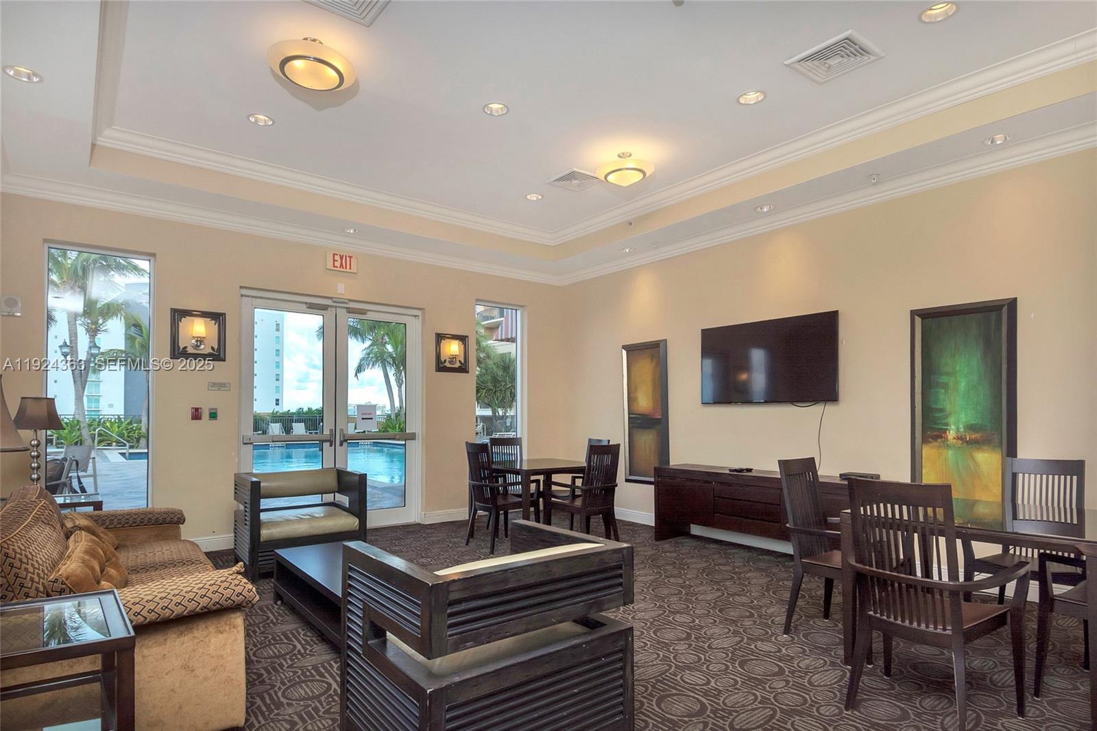 3232 Southwest 22nd Street, Unit 905 Miami, FL 33145 - Photo 23 of 24 a living room with furniture and a large window