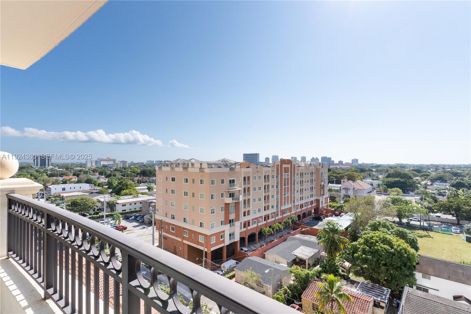 3232 Southwest 22nd Street, Unit 905 Miami, FL 33145 - Photo 5 of 24 a view of a city from a balcony