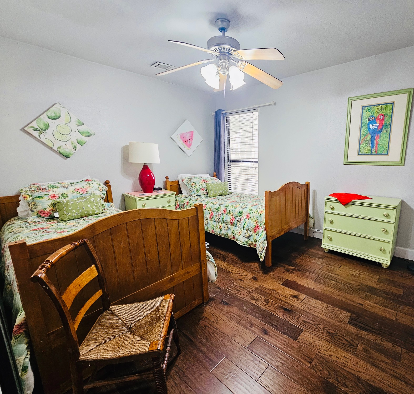5107 Leralynn Street, Unit 304 Austin, TX 78751 - Photo 10 of 28 Bedroom with dark wood-style floors and a ceiling fan