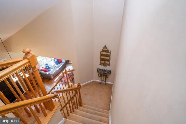 a bath tub sitting in a bathroom next to a window