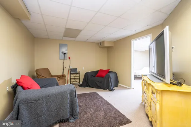 an aerial view of residential houses with yard