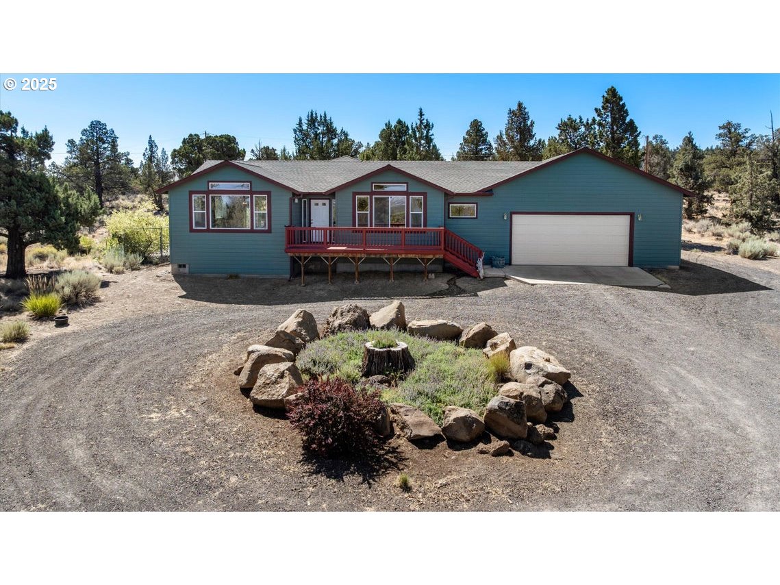 21085 Arid Avenue Bend, OR 97703 - Photo 1 of 45 a bathroom with a sink mirror and vanity