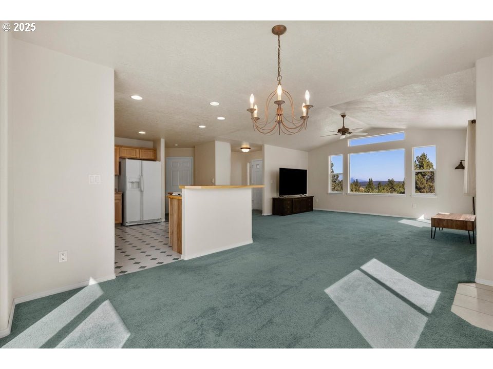 21085 Arid Avenue Bend, OR 97703 - Photo 13 of 45 a view of a kitchen and stove