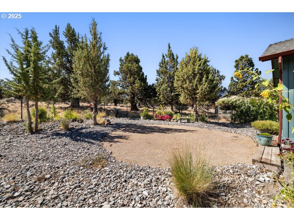21085 Arid Avenue Bend, OR 97703 - Photo 29 of 45 a view of a backyard of the house