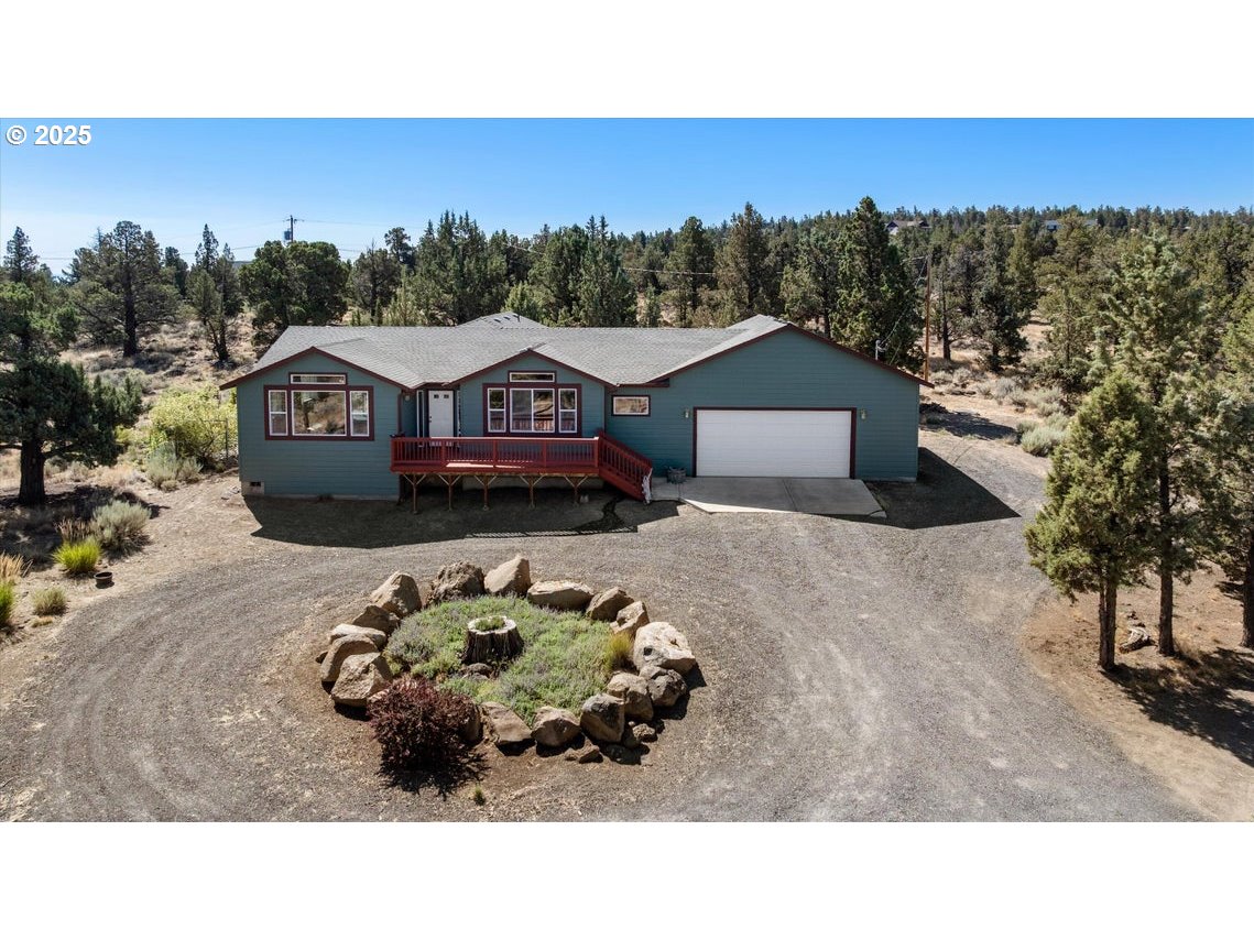 21085 Arid Avenue Bend, OR 97703 - Photo 35 of 45 a picture of a house with a outdoor space