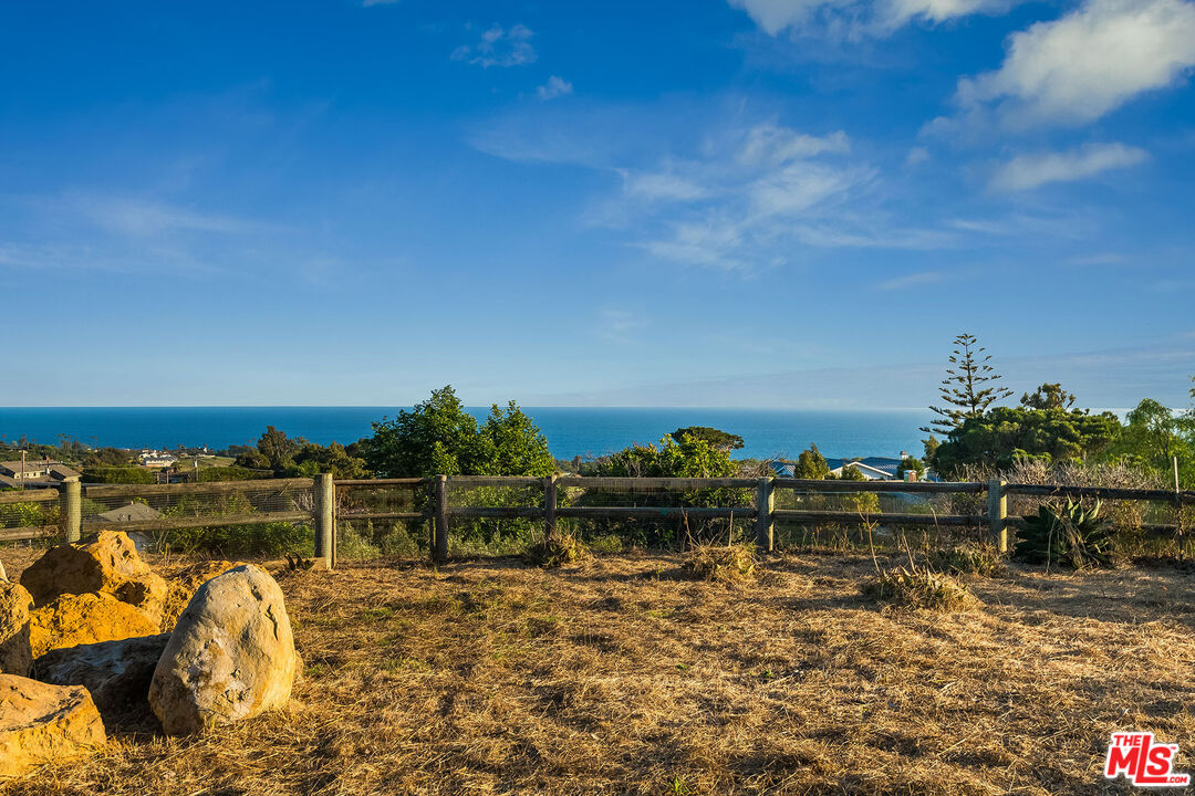 29829 Harvester Road Malibu, CA 90265 - Photo 11 of 44 a front view of a house with a ocean view