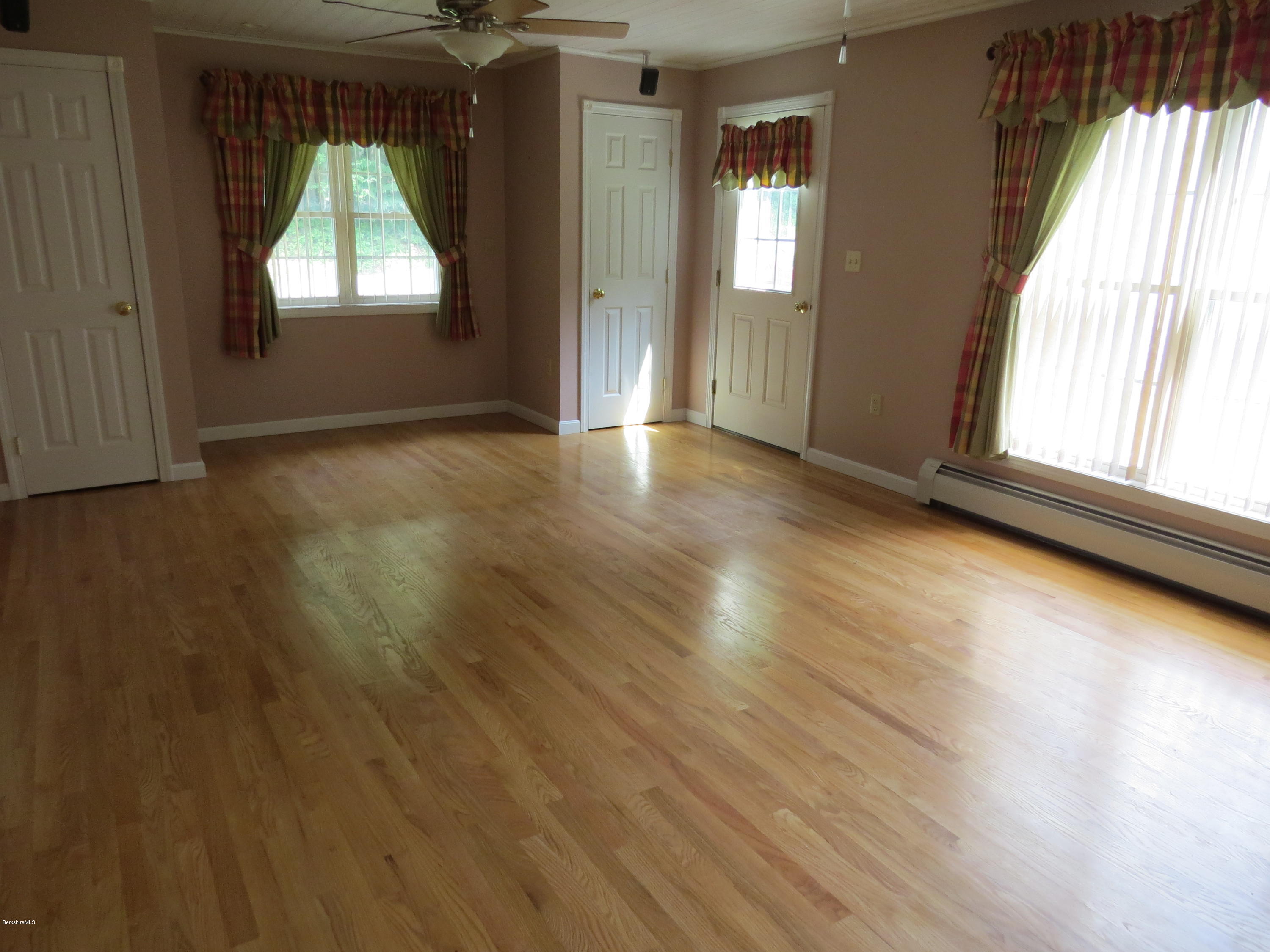 39 Harding Avenue Adams, MA 01220 - Photo 18 of 54 Living Room with access to side deck
