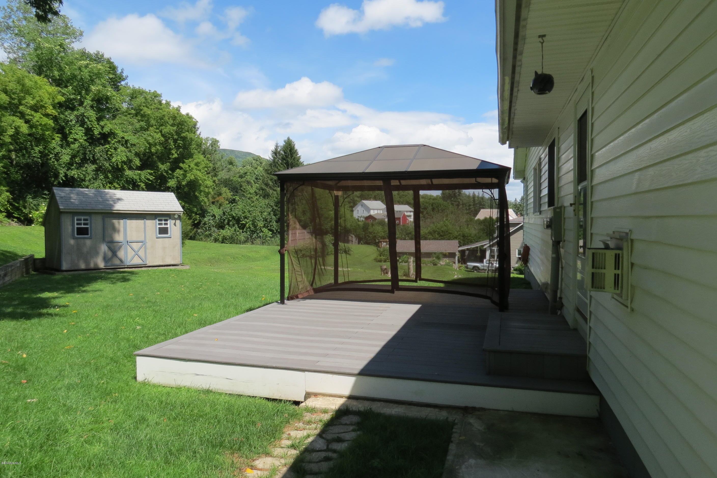 39 Harding Avenue Adams, MA 01220 - Photo 6 of 54 Back deck off with screened in living
