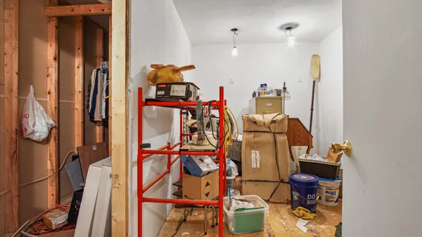 a bathroom with a sink a mirror and shower
