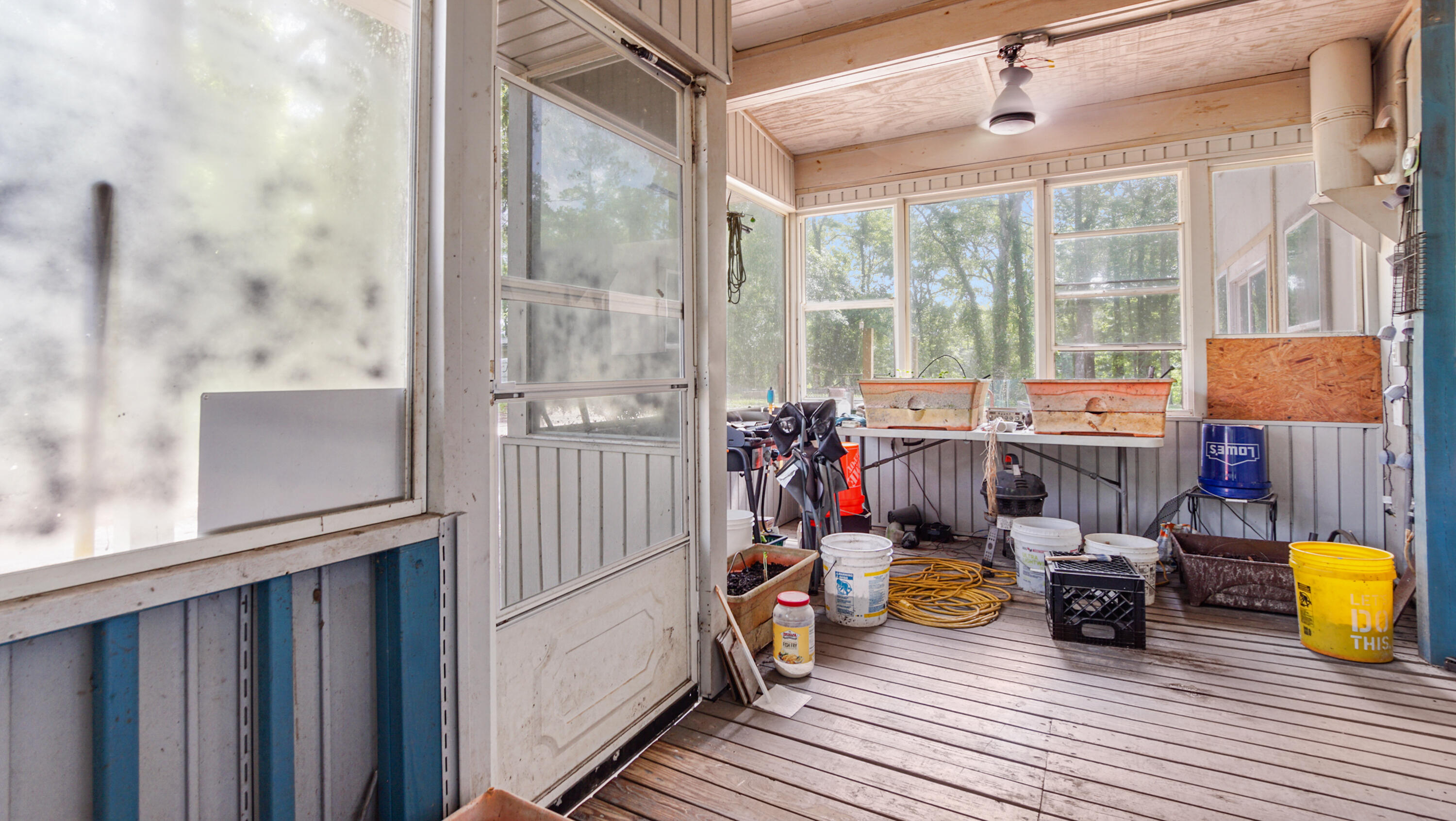 70 River Loop Road Ponce de Leon, FL 32455 - Photo 32 of 50 a view of a hall with wooden floor and furniture