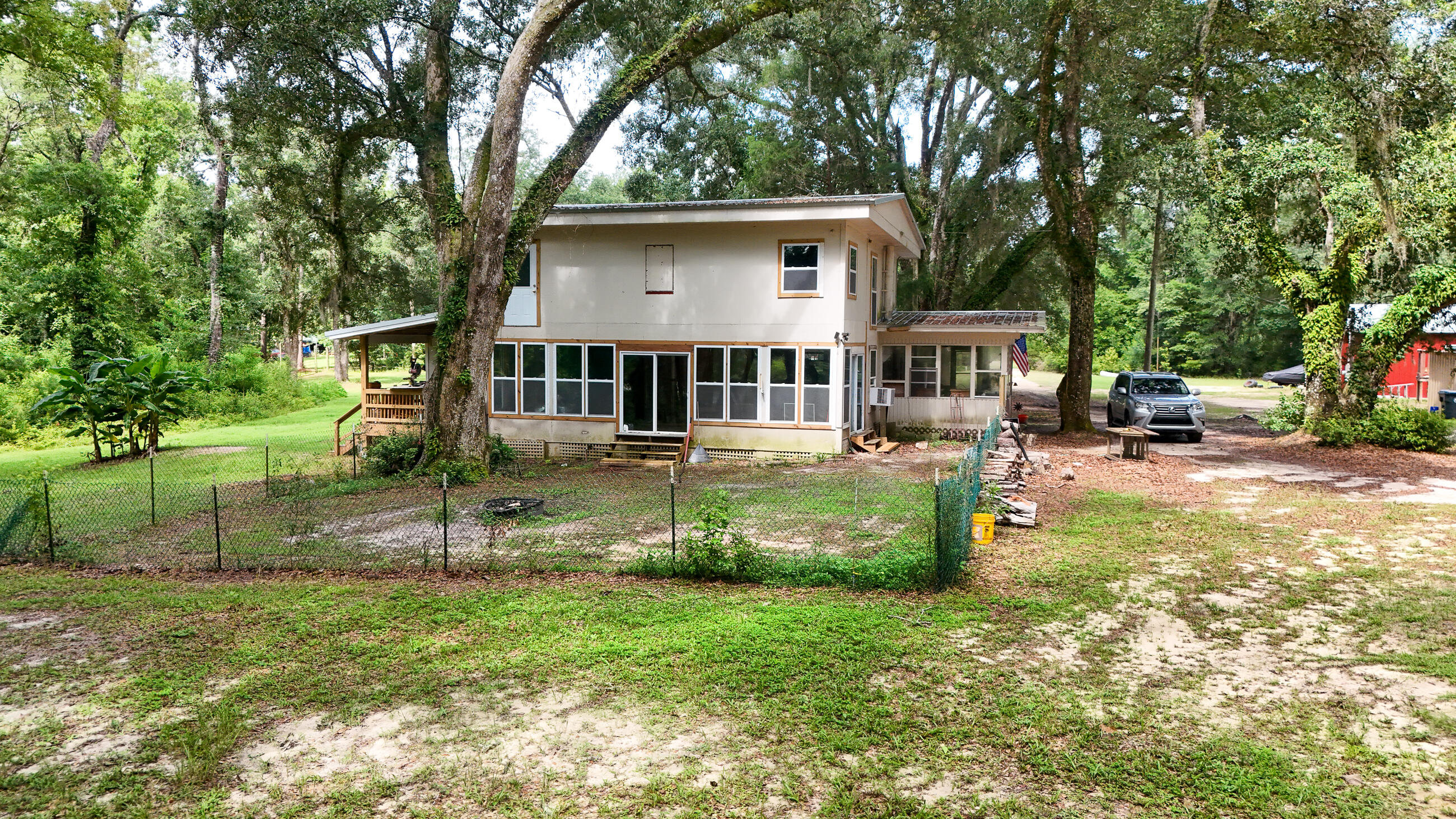 70 River Loop Road Ponce de Leon, FL 32455 - Photo 4 of 50 a view of a house with a yard