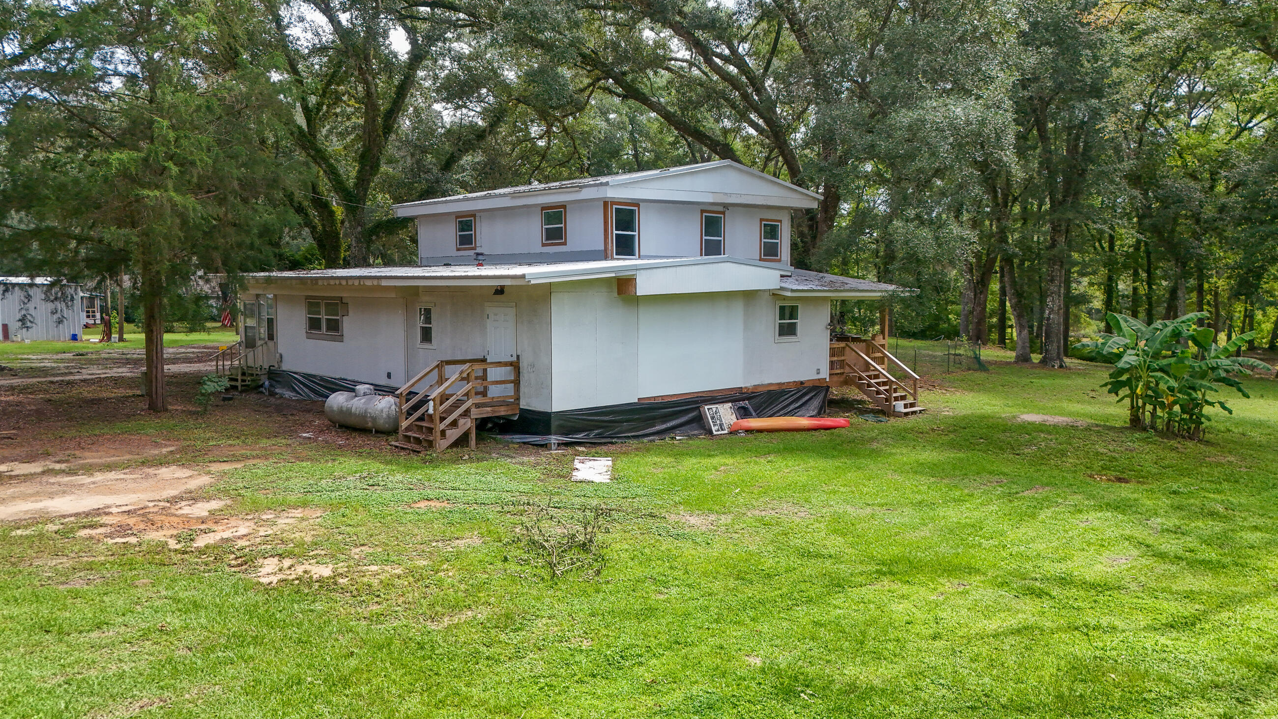 70 River Loop Road Ponce de Leon, FL 32455 - Photo 49 of 50 a view of a house with backyard