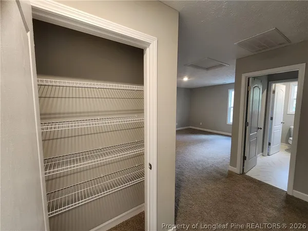 a view of livingroom with closet