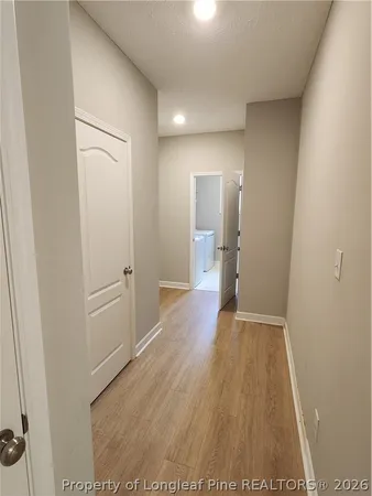 a view of wooden floor in an empty room