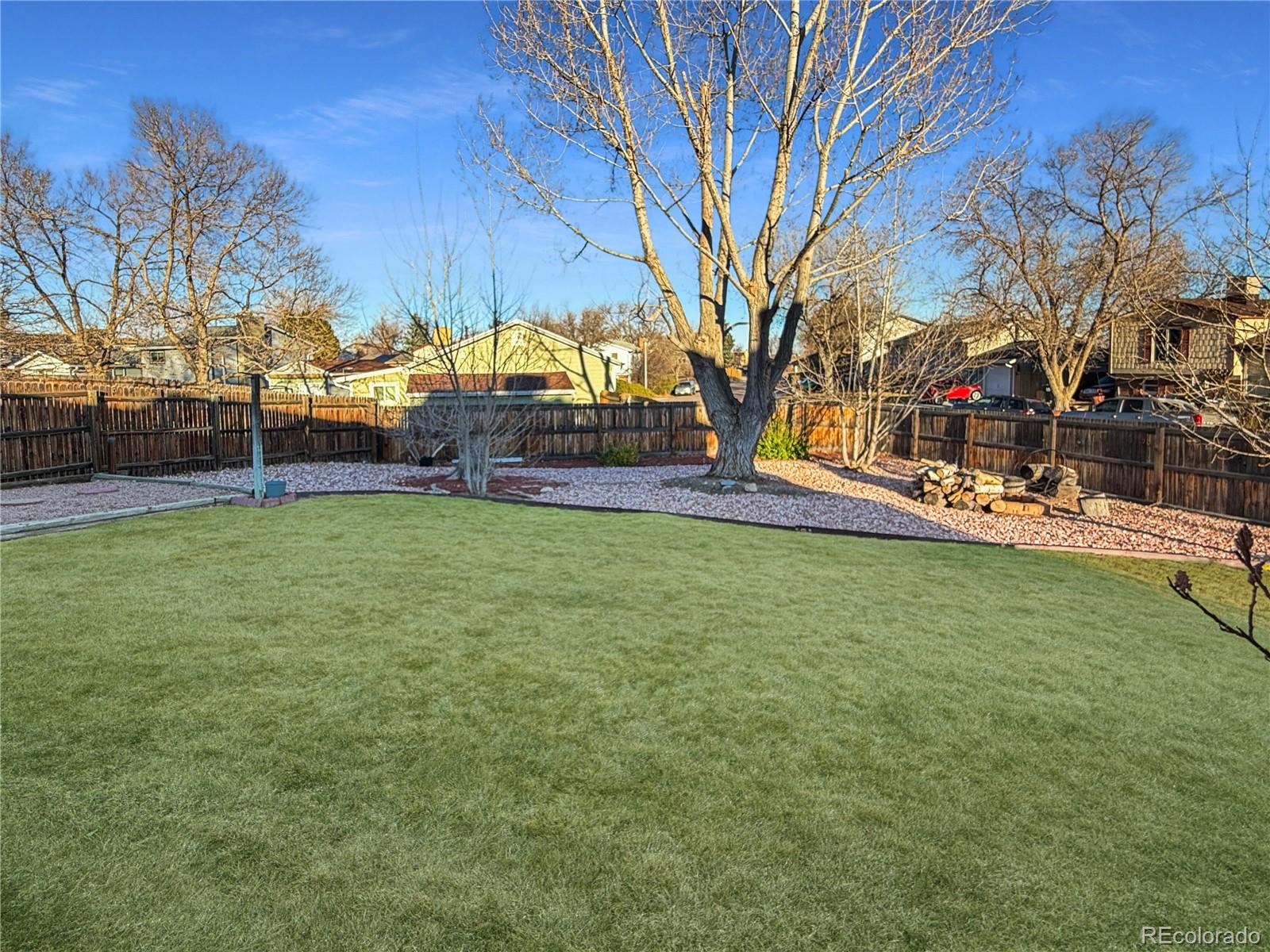 4386 South Xenophon Way Morrison, CO 80465 - Photo 33 of 38 a view of a yard with a house in the background