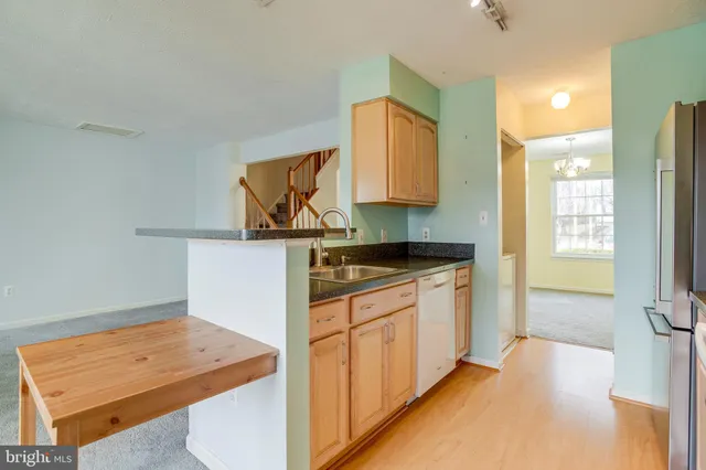 a view of hallway with washer and dryer